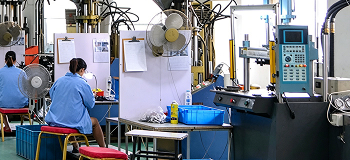 Worker working on production line